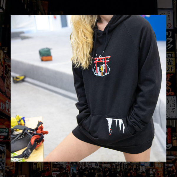 Steinblokk - Female rock climber wearing hoodie